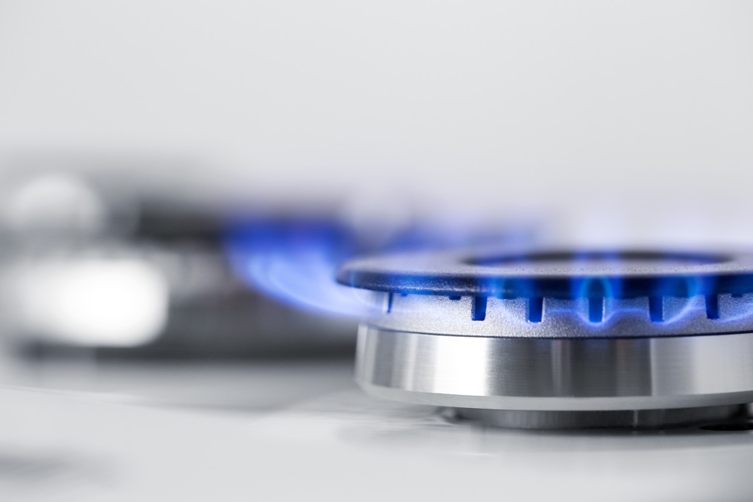 5-burner gas cooktop made in Italy in white finish with sealed burners, cast iron grates, wok stand, and stainless steel frame to allow installation in 30